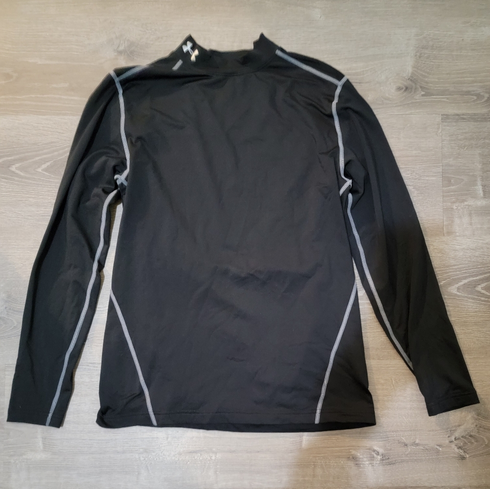 Under Armour fitted/compression long sleeve. Like new